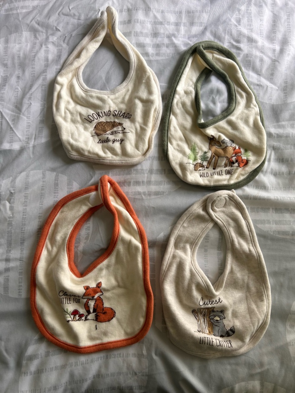 Pack of 4 Cream Baby Bibs with Orange & Green Trim - Woodland Animal Designs